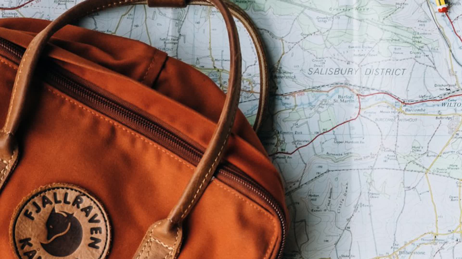 Moment shot: the packed backpack sitting on the map, ready to go.